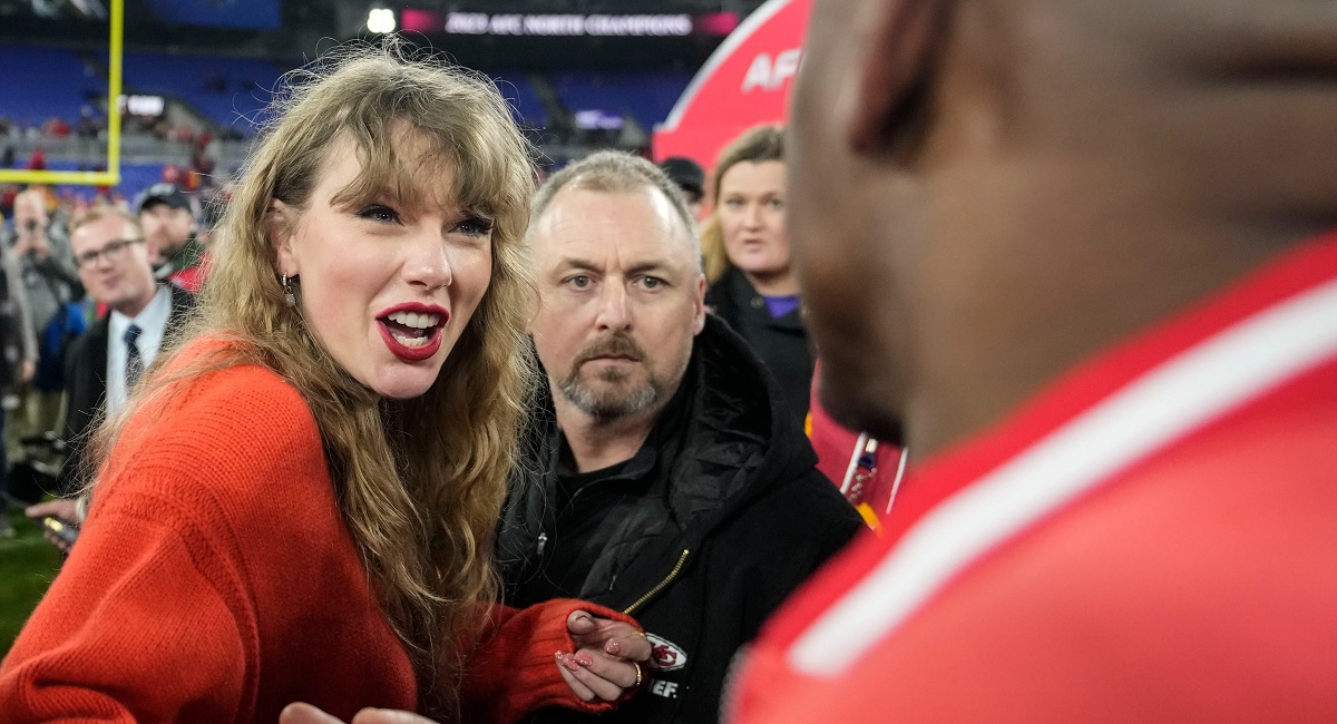 Awkward moment Ravens fans shout abuse at Taylor Swift for ‘ruining the NFL’ as she walked through the Maryland stadium to the afterparty before she slings back a retort: ‘I didn’t do anything’