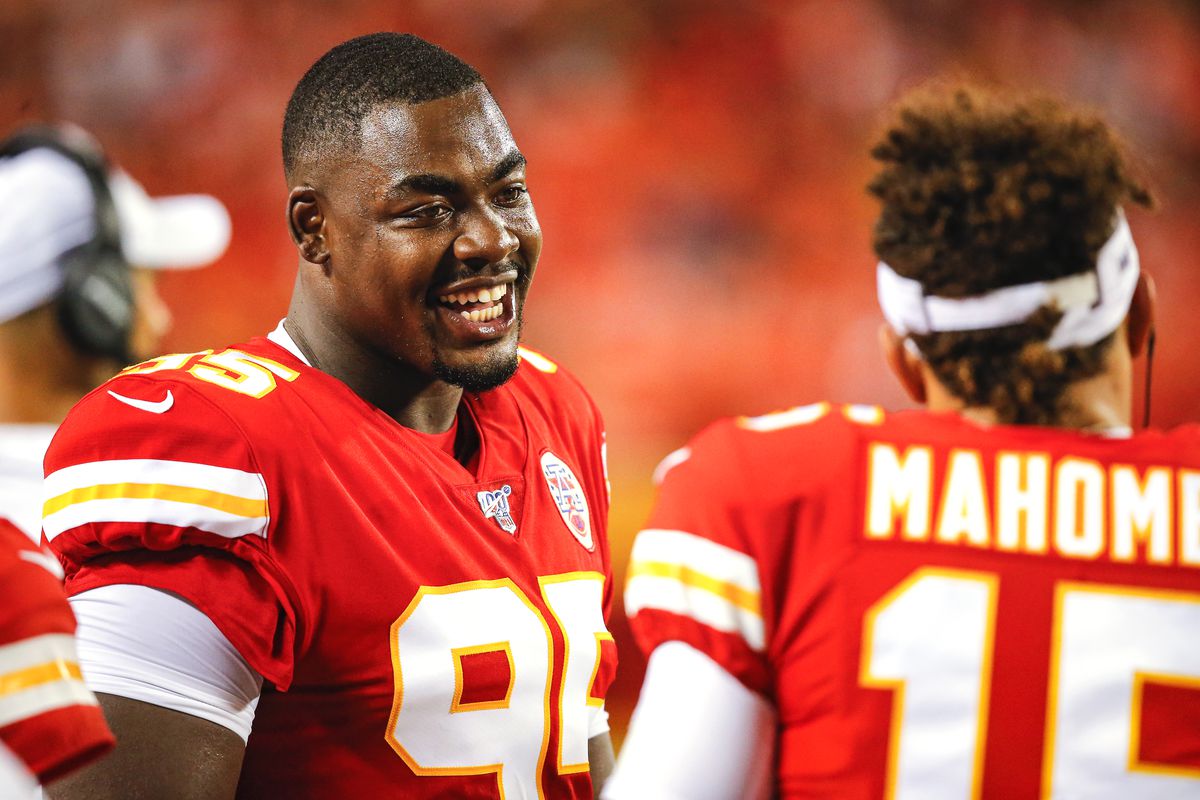 Chiefs players Chris Jones and Patrick Mahomes celebrate his $158.8 million contract………