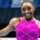 Simone Biles’ Youngest Family Member Baby Biles Dons Her Gymnastics Victory Outfit as She Jumps With Joy
