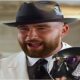 Travis Kelce arrives for Kentucky Derby without Taylor Swift as dapper Chiefs star rocks white suit and black top hat
